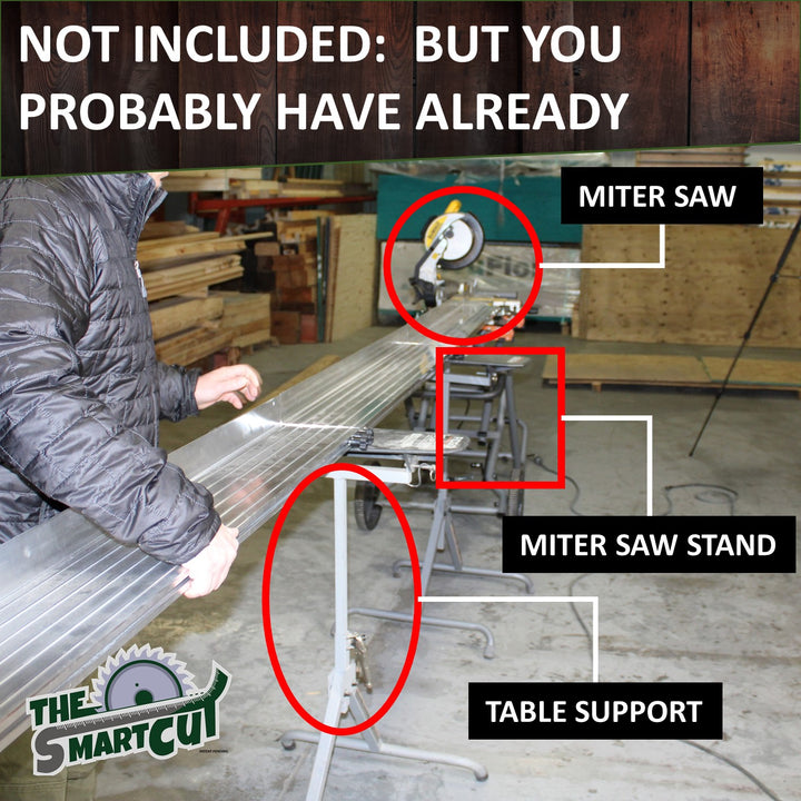 The Smart Cut aluminum rail fence attached to a miter saw mounted on a portable saw stand, with an adjustable table support leg holding up the fence in a workshop