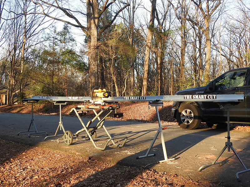 photo of a miter saw with a measuring system installed outdoors